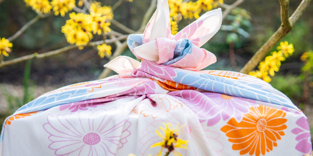 A gift wrapped in a furoshiki Flower Wrap